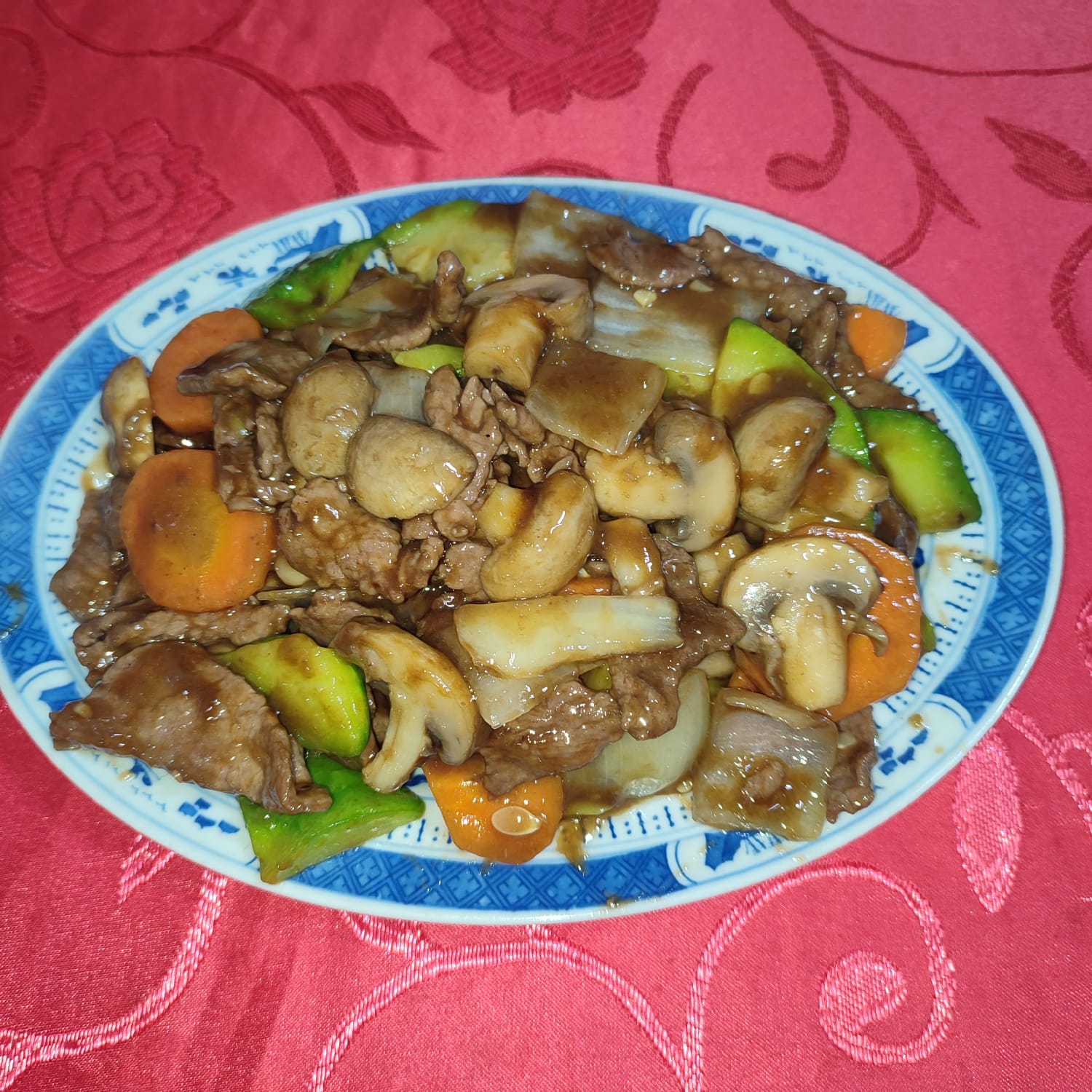 26. Carne con Champignones